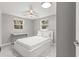 Well lit bedroom featuring a full-size bed and window at 11782 Sw 140Th St, Dunnellon, FL 34432