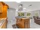 Modern kitchen with stainless steel appliances and an island at 11782 Sw 140Th St, Dunnellon, FL 34432