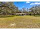 Ranch home, spacious backyard, and large oak trees at 11782 Sw 140Th St, Dunnellon, FL 34432