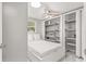 Bedroom with a full bed and built in shelving at 11782 Sw 140Th St, Dunnellon, FL 34432