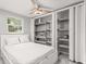 Bedroom with full bed and ample storage at 11782 Sw 140Th St, Dunnellon, FL 34432