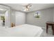 Cozy bedroom with ceiling fan and plenty of closet space at 11782 Sw 140Th St, Dunnellon, FL 34432
