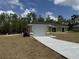 Newly built home with a single-car garage at 233 Locust Ln, Ocala, FL 34472