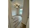 Bright bedroom with wood-look floors and ceiling fan at 233 Locust Ln, Ocala, FL 34472