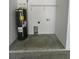 Garage interior with water heater and shelving at 233 Locust Ln, Ocala, FL 34472