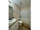 Clean bathroom with tub, shower, and vanity at 233 Locust Ln, Ocala, FL 34472
