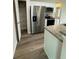 Kitchen with stainless steel appliances and pantry at 233 Locust Ln, Ocala, FL 34472