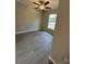 Bedroom with ceiling fan and vinyl flooring at 235 Locust Ln, Ocala, FL 34472