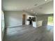 Open concept kitchen features stainless steel appliances at 235 Locust Ln, Ocala, FL 34472