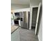 Modern kitchen with white cabinets and pantry at 235 Locust Ln, Ocala, FL 34472