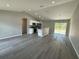 Open kitchen with stainless steel appliances and an island at 235 Locust Ln, Ocala, FL 34472