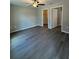Spacious bedroom with ceiling fan and large closet at 235 Locust Ln, Ocala, FL 34472