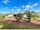 Landscaped backyard with palm trees at 15338 Sw 14Th Avenue Rd, Ocala, FL 34473