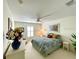 Bright bedroom with a king-size bed and window shutters at 15338 Sw 14Th Avenue Rd, Ocala, FL 34473