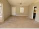 Spacious living room with carpeted floors and ceiling fan at 7946 Juniper Rd, Ocala, FL 34480