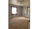Bright bedroom with neutral walls and carpeted floors at 7946 Juniper Rd, Ocala, FL 34480