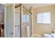 Clean bathroom with a shower and grab bars for accessibility at 5247 Nw 18Th St, Ocala, FL 34482