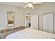 Spacious bedroom with dresser and mirrored closet doors at 5247 Nw 18Th St, Ocala, FL 34482