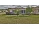 Cute house with a screened porch and manicured lawn at 5247 Nw 18Th St, Ocala, FL 34482