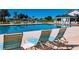 Relaxing community pool with lounge chairs at 5247 Nw 18Th St, Ocala, FL 34482