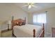 Charming bedroom featuring a wooden bed frame and nightstand at 5247 Nw 18Th St, Ocala, FL 34482