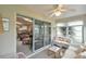 Relaxing sunroom with comfortable seating and access to backyard at 5247 Nw 18Th St, Ocala, FL 34482