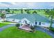 Aerial view of the clubhouse with green roof at 5247 Nw 18Th St, Ocala, FL 34482