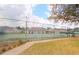 Community tennis courts with ample green space at 2322 Se 19Th Cir, Ocala, FL 34471