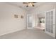 Home office with double doors opening to the living room at 7127 Sw 91St Ct, Ocala, FL 34481