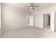 Spacious bedroom with carpeted floor and ceiling fan at 7127 Sw 91St Ct, Ocala, FL 34481
