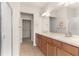 Bathroom boasts double vanity and walk-in shower at 7127 Sw 91St Ct, Ocala, FL 34481