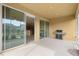 Spacious screened patio with sliding glass doors and built-in grill at 7127 Sw 91St Ct, Ocala, FL 34481