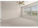 Spacious bedroom with neutral walls and carpeted floor at 7127 Sw 91St Ct, Ocala, FL 34481