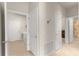 Hallway with access to laundry, bedrooms and more at 7127 Sw 91St Ct, Ocala, FL 34481