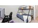 Bedroom with a bunk bed and a workspace at 4336 Nw 55Th Ct, Ocala, FL 34482