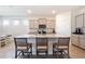 Spacious kitchen featuring a large island with granite countertops and stainless steel appliances at 4336 Nw 55Th Ct, Ocala, FL 34482