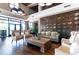 Community clubhouse lounge with comfortable seating and a fireplace at 4336 Nw 55Th Ct, Ocala, FL 34482