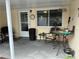 Relaxing patio with seating area, perfect for outdoor enjoyment at 9897 Sw 88Th Court Rd # H, Ocala, FL 34481