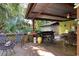 Covered patio with outdoor kitchen featuring a Blackstone griddle at 3751 Se 3Rd Ave, Ocala, FL 34471