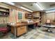 Well-lit workshop with ample workbenches and storage at 3751 Se 3Rd Ave, Ocala, FL 34471