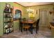 Charming dining room with a rustic table, chandelier, and unique decor at 3751 Se 3Rd Ave, Ocala, FL 34471