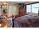Serene bedroom with hardwood floors, large windows, and ample closet space at 3751 Se 3Rd Ave, Ocala, FL 34471