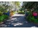Gated entry to home with lush landscaping and mailbox at 3751 Se 3Rd Ave, Ocala, FL 34471