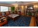 Spacious living room with hardwood floors, comfortable seating, and eclectic decor at 3751 Se 3Rd Ave, Ocala, FL 34471