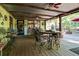 Relaxing covered patio with outdoor seating and dining area at 3751 Se 3Rd Ave, Ocala, FL 34471