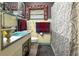 Retro bathroom with teal sink, tiled walls, and shower stall at 3751 Se 3Rd Ave, Ocala, FL 34471