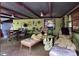 Covered patio with lounge chairs and a tranquil atmosphere at 3751 Se 3Rd Ave, Ocala, FL 34471