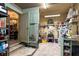 Laundry and storage area with washer, shelves, and additional storage at 3751 Se 3Rd Ave, Ocala, FL 34471