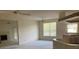 Spacious living room with high ceilings and a fireplace at 610 Grand Vista Trl, Leesburg, FL 34748