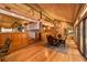 Spacious dining area with hardwood floors and access to a deck at 2162 Se Mill Creek Cir, Ocala, FL 34471